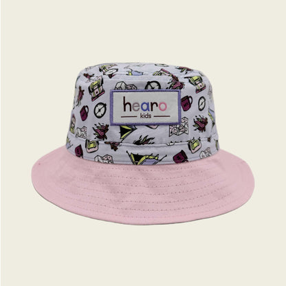 Bucket hat with colorful pattern and pink brim on a beige background